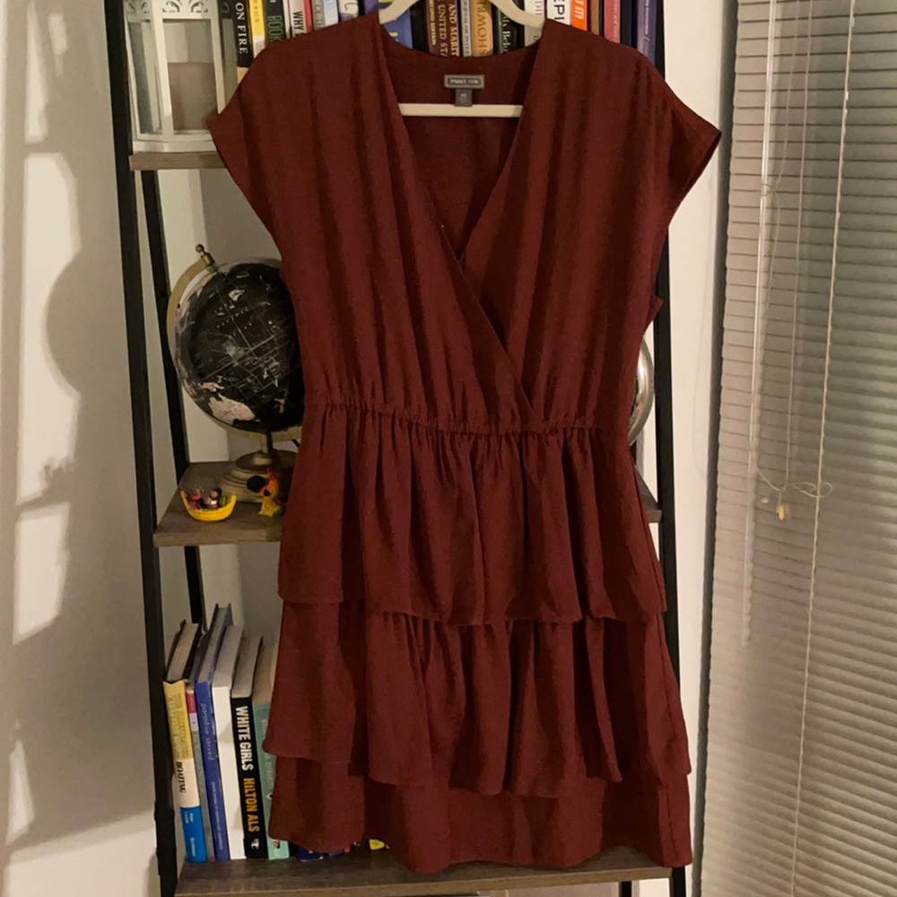 Above the knee ruffle rust colored dress with cap sleeves